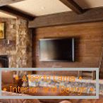 Krásny interiér obývacej izby z kameňa a dreva