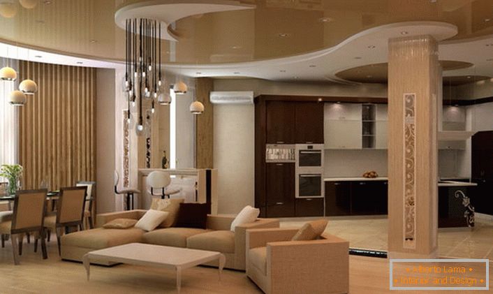 Zaujímavá možnosť osvetlenia obývacej izby v modernom štýle. Charakteristickou črtou interiérov v modernom štýle sú lesklé povrchy, napríklad dvojvrstvový strop.