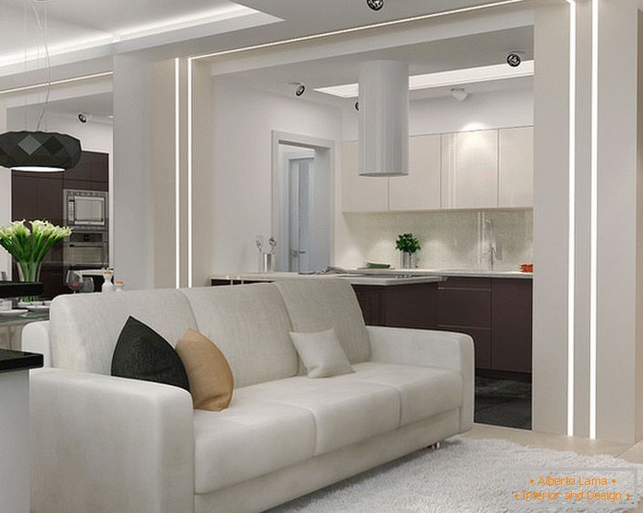 Malá obývacia izba v štýle minimalizmu v štúdiovom apartmáne. Funkčnosť a atraktívnosť interiéru v tomto štýle je nezastupiteľná, pokiaľ ide o usporiadanie malého obytného priestoru.