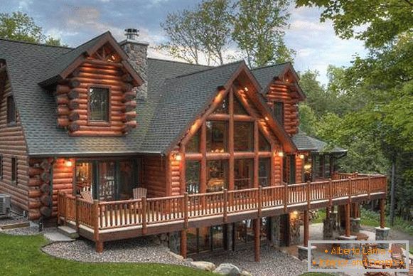 Luxusné drevené domy z lúča na fotografii