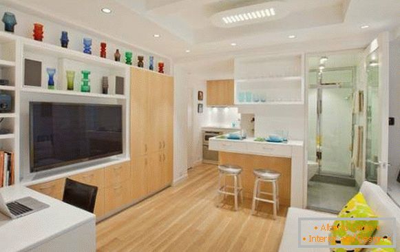 Obývacia izba, kuchyňa a kúpeľňa v dizajne byt 40 m² fotografie