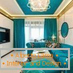 Zlato kombinované s modrou v interiéri spálne-obývacia izba