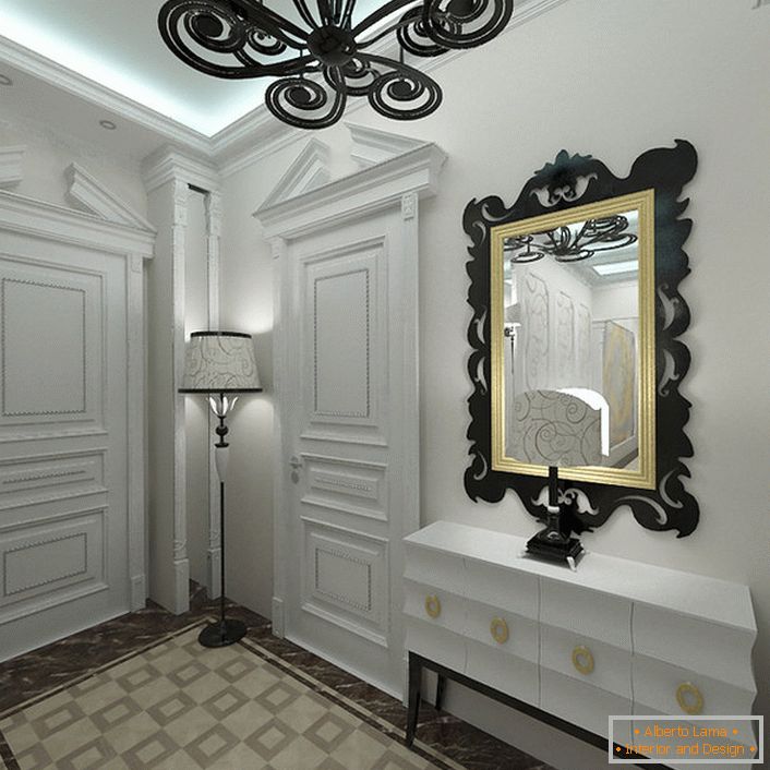 V štýle Art deco sa páči svetlý odtieň v interiéri. Vchod, zdobený bielej farby, je pozoruhodný pre správne vybrané kontrastné dekoratívne prvky.