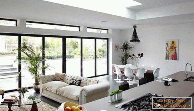 Dizajnové štúdiové apartmány s panoramatickými oknami - fotografie kuchyne obývacej izby
