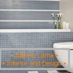 Kombinácia dlaždice a mozaiky v dizajne toalety