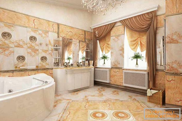 Farba slonoviny sa harmonicky kombinuje s odtieňmi jasne oranžovej v kúpeľni, zdobené v empírovom štýle.